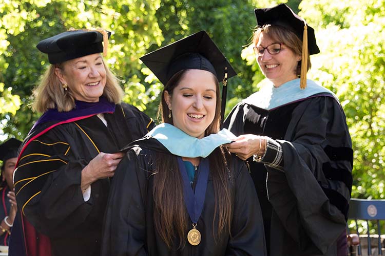 Randolph MAT graduates process and receive their stoles during Randolph College's commencement ceremony.